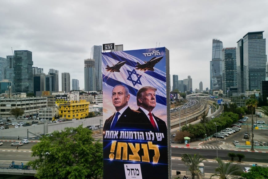 A drone view of an election campaign display for Israeli Prime Minister Benjamin Netanyahu's Likud party, depicting Netanyahu and US President Donald Trump with the words in Hebrew "we have one opportunity to win!", the day before Israel's national election, in Tel Aviv, Israel, October 26, 2026. REUTERS/Amir Cohen