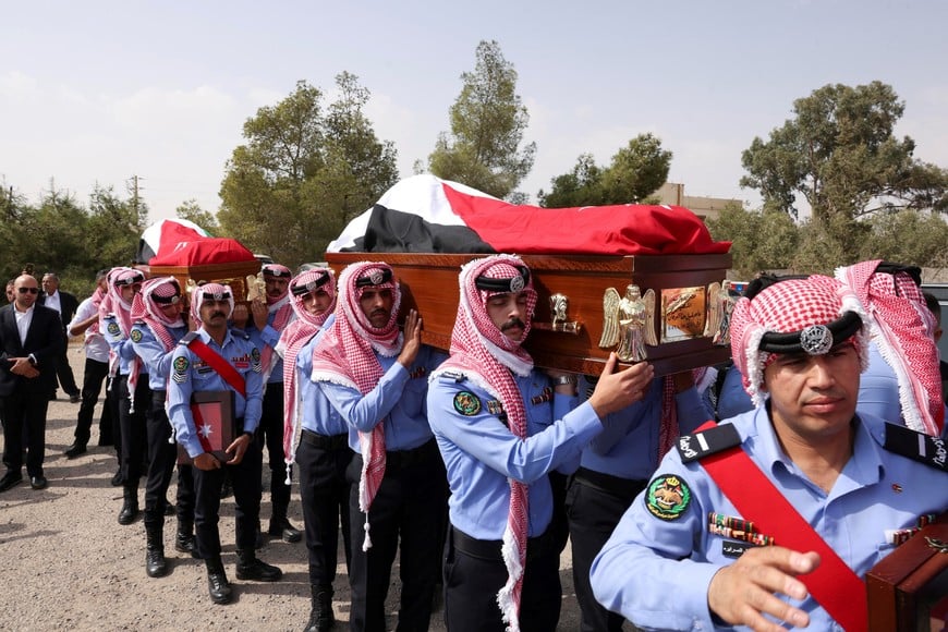 Pallbearers carry the coffins of victims of a church shooting in Karak, Jordan, October 25, 2026. REUTERS/Alaa Al Sukhni