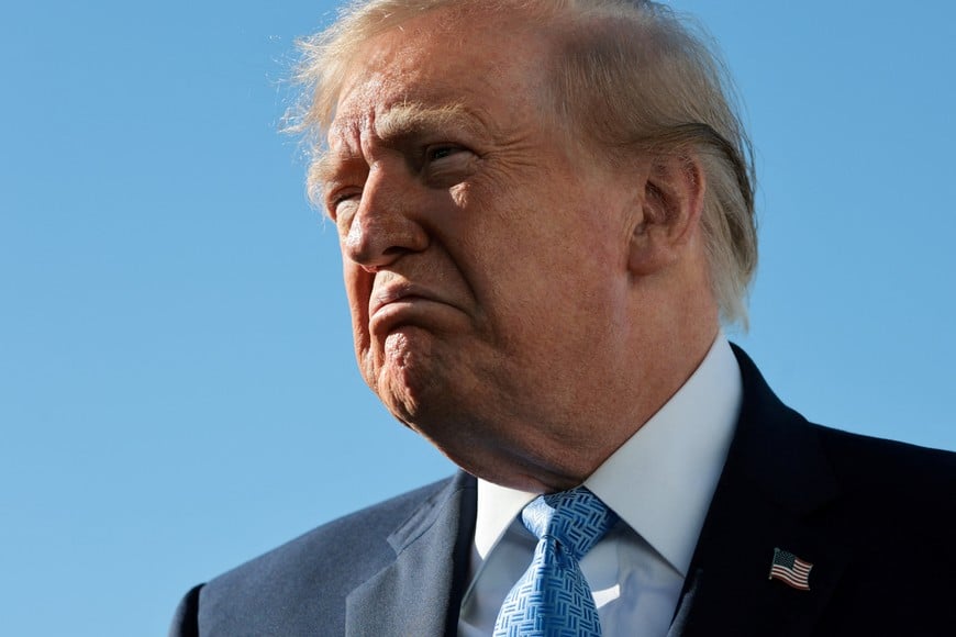 US President Donald Trump reacts as he speaks to reporters before boarding Air Force One for travel to Mississippi from Joint Base Andrews, Maryland, US, October 26, 2026. REUTERS/Jonathan Ernst