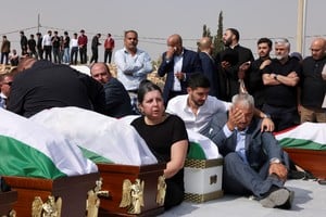 People attend the funeral of victims of a church shooting in Karak, Jordan, October 25, 2026. REUTERS/Alaa Al Sukhni