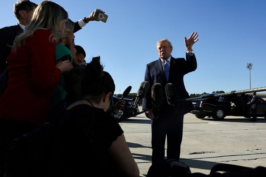 US President Donald Trump speaks to reporters before boarding Air Force One for travel to Mississippi from Joint Base Andrews, Maryland, US, October 26, 2026. REUTERS/Jonathan Ernst
