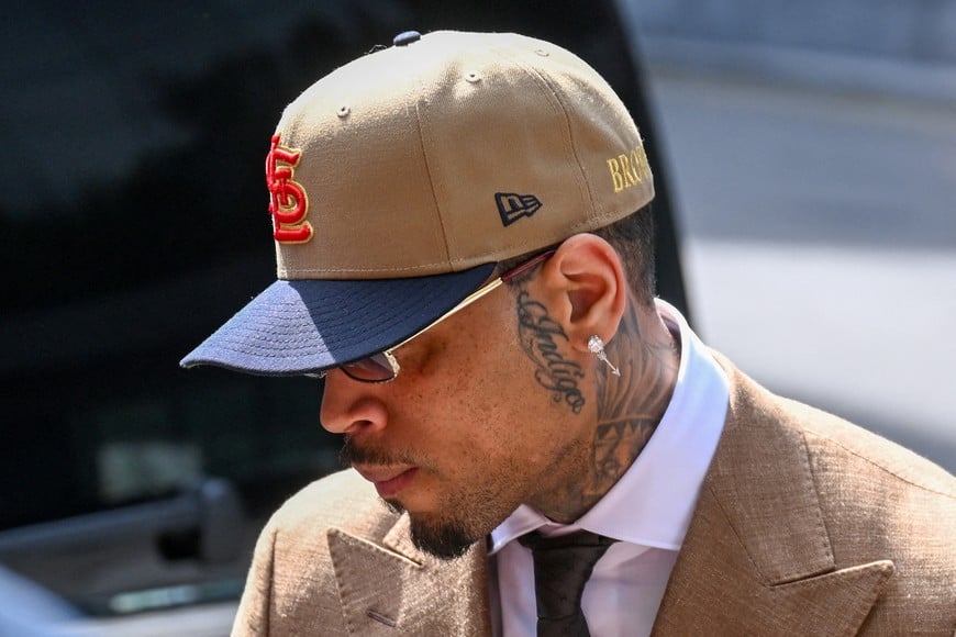 U.S. singer Chris Brown, who has been charged with inflicting grievous bodily harm in what prosecutors said was an "unprovoked attack" in a London nightclub in 2023, appears at Southwark Crown Court in London, Britain, July 24, 2026. REUTERS/Jaimi Joy TPX IMAGES OF THE DAY