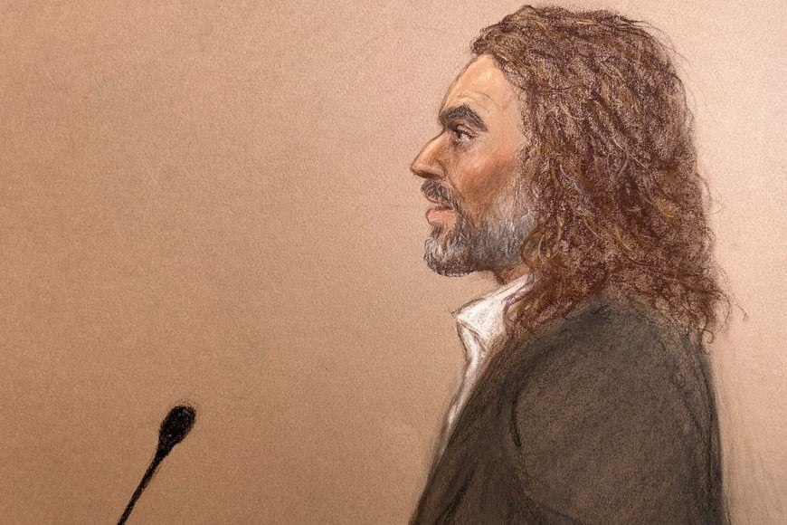 British actor and comedian Russell Brand appears at Southwark Crown Court, where he gives evidence in his trial on charges of rape and sexual assault involving six women between 1999 and 2009, which he denies, in London, Britain, October 28, 2026, in this courtroom sketch. REUTERS/Julia Quenzler