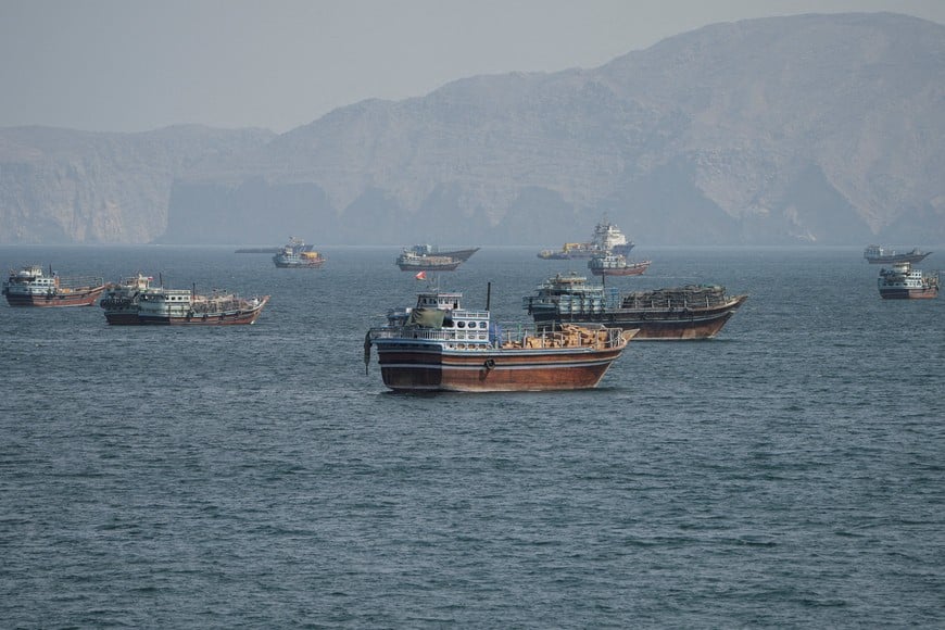 FILE PHOTO: Vessels at the Strait of Hormuz, as seen from Musandam, Oman, October 2, 2026. REUTERS/Stringer/File Photo
