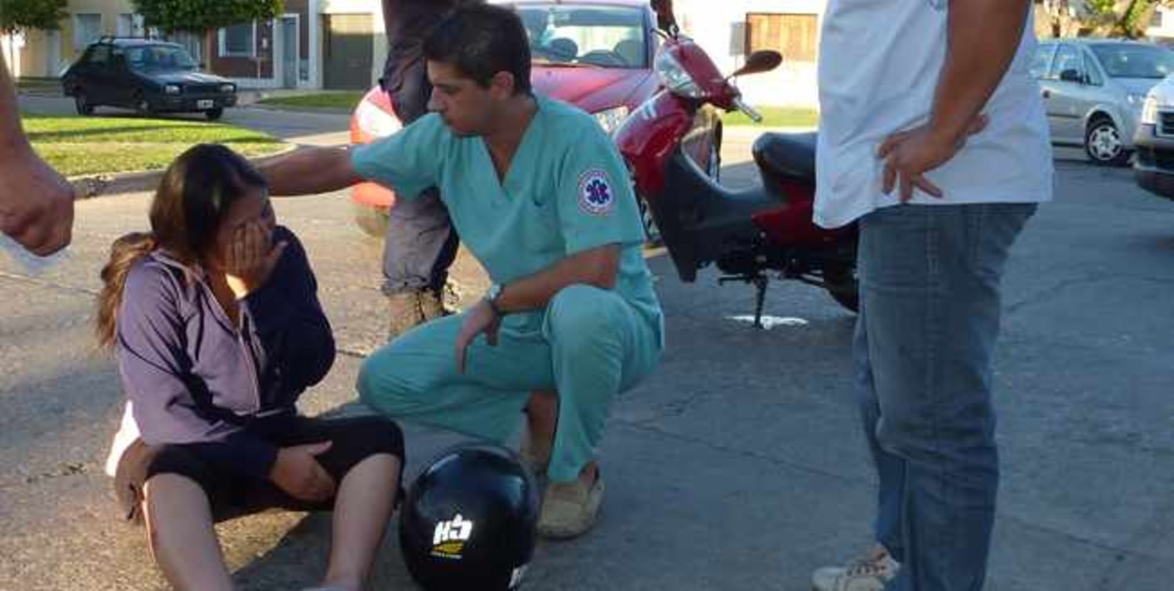 Motociclista accidentada