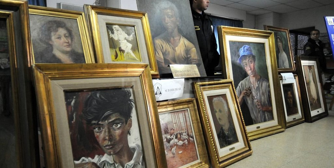 Cuadros, pesos, dólares, euros y armas