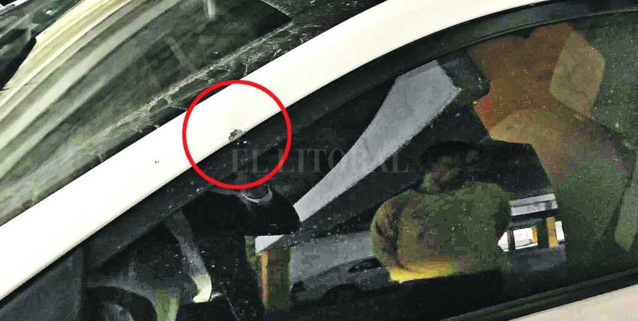 Un tiro en el auto