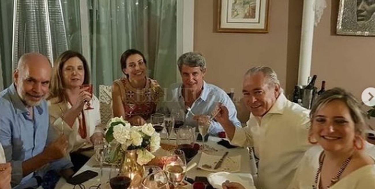 Dos santafesinos en el cumpleaños de Carrió