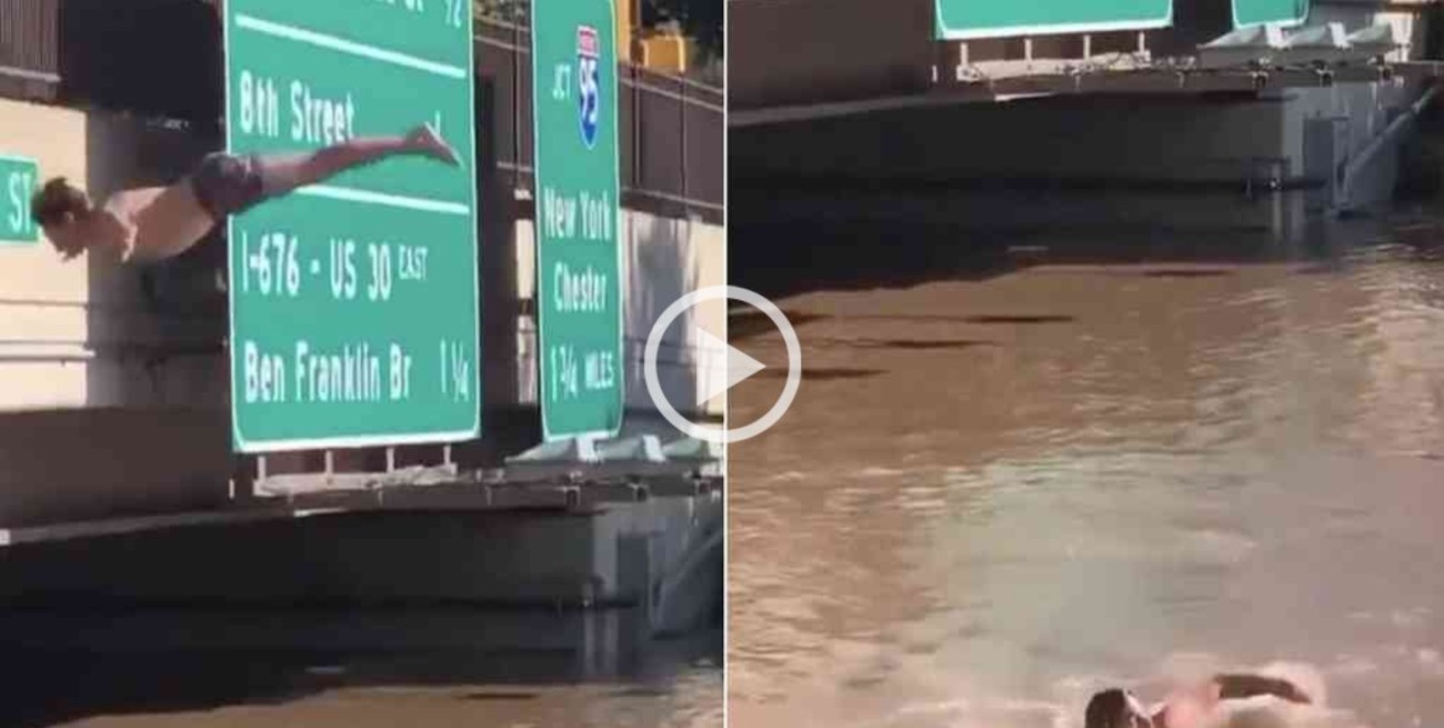 Video: un hombre saltó de espalda en las aguas que inundan una autopista en Filadelfia
