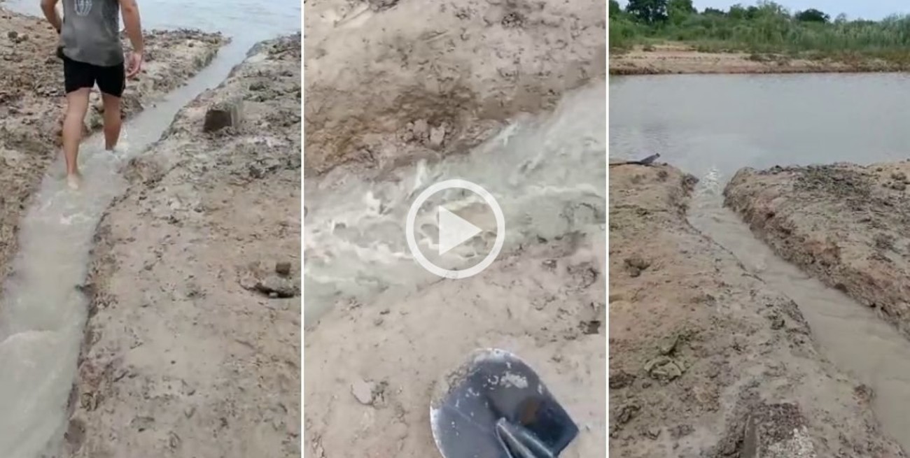 Guardavidas cavaron un canal hacia la Laguna Setúbal para liberar la fauna atrapada en "una olla"