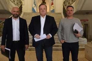 Puccini, Michilg y Enrico, tres de los ministros de origen radical que trabajan en la definición de sus equipos de trabajo. Foto: Luis Cetraro