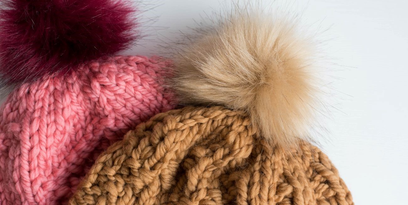 Por qué los gorros de lana llevan un pompón en la parte superior
