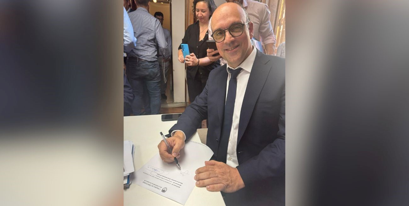 Las firmas en la Ley de reforma