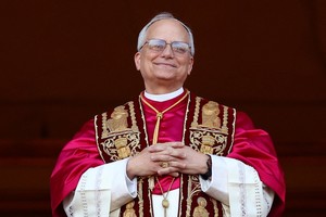 Newly elected Pope Leo XIV, Cardinal Robert Prevost of the United States appears on the balcony of St. Peter's Basilica, at the Vatican, May 8, 2025. REUTERS/Guglielmo Mangiapane