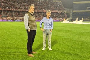 Pablo Cococcioni y Juan Pablo Quinteros en la cancha