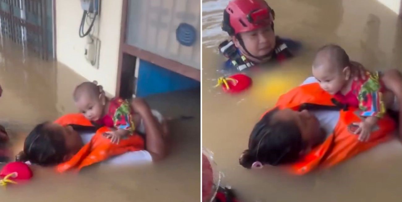 Con el agua al cuello: así protegió a su bebé en medio de una inundación en Tailandia
