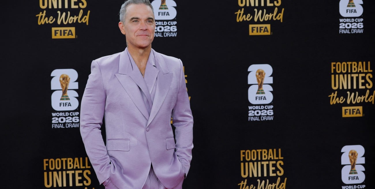 Robbie Williams lanzó por sorpresa su nuevo álbum y busca romper un récord histórico