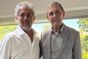 Carlos Castellani junto a Adrián Menem.