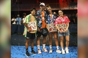Los campeones de Miami en ramas masculina y femenina. Foto: Gentileza