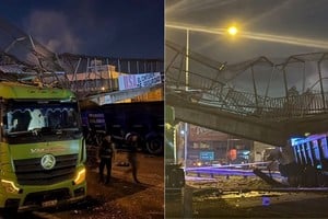 Otro camión quedó atrapado debajo del bloque de hormigón y la traza fue cortada en ambas manos.