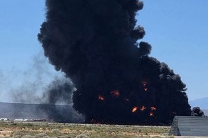 Las imágenes aéreas mostraron un paisaje calcinado y humeante en el lugar donde ocurrió el accidente.